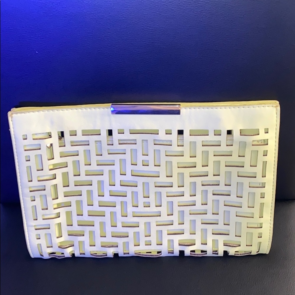 Woman’s yellow decorative clutch